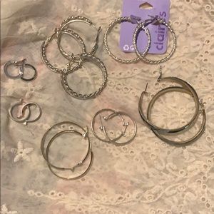 7 prs of silver costume hoop earrings